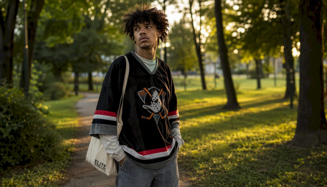 Young adult showing 2026 streetwear style outdoors