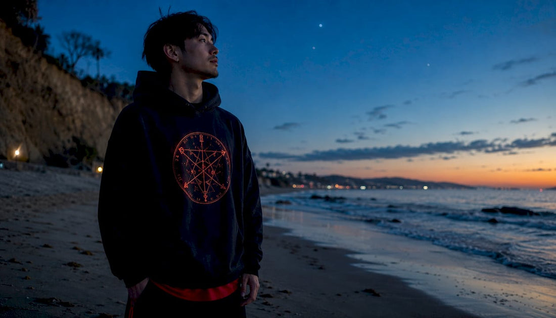 Person wearing sigil hoodie on urban rooftop