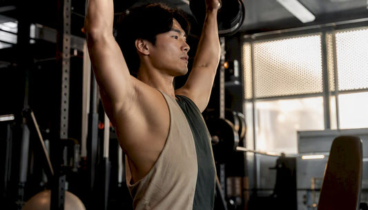 Gym workout showing stringer and tank top fit