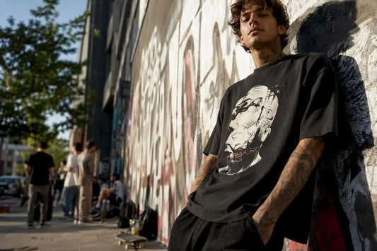 Young adult adjusting heavyweight streetwear tee