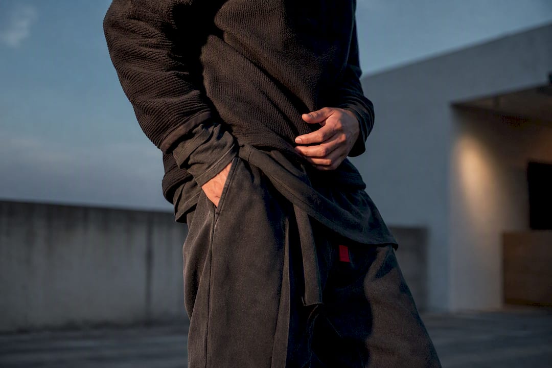 Layered monochrome streetwear shown through texture